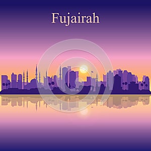 Fujairah silhouette on sunset background