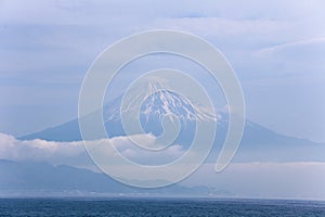 Fuji Mountain in Mist above the Sea