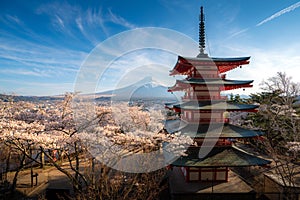 Fujiyoshida, Japan at Chureito Pagoda and Mt. Fuji in the spring with cherry blossoms full bloom during sunrise. Japan Landscape