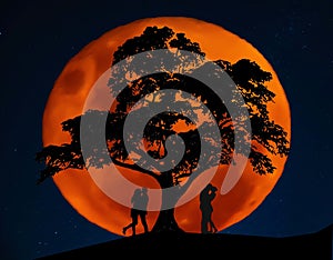 Full blood moon with southern cross stars in background as silhouette of a couple kissing under the Lebanese cedar tree