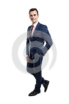 Full body of attractive business man posing with hand in pocket