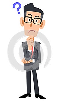 Full body of a businessman with glasses having doubts