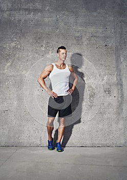 Full body fitness portrait of muscular man