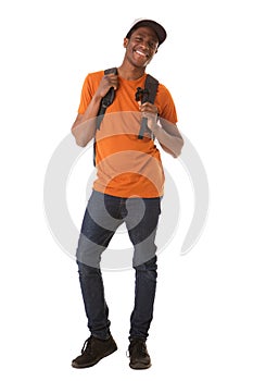 Full body happy african american man with mobile phone and bag against isolated white background