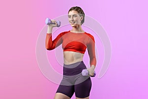 Full body length gaiety shot athletic and sporty woman with dumbbell
