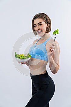 Full body length gaiety shot athletic and sporty young woman with healthy vegan