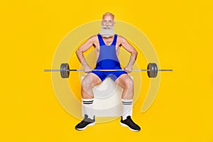 Full body length photo of old gray mustache beard senior sitting platform hold barbell before exercise cadre isolated on