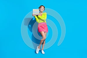 Full body length size photo of young woman smart student preparing for exams in university pile books isolated on blue