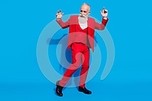 Full body photo of aged rich man happy positive smile have fun dance party isolated over blue color background