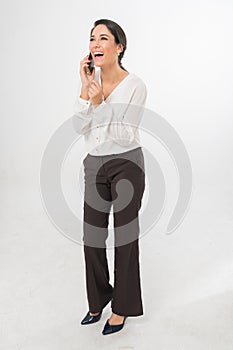 Full Body Photo of a Beautiful Brazilian Business Woman Talking on phone