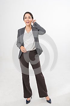 Full Body Photo of a Beautiful Brazilian Businesswoman in Office Suit