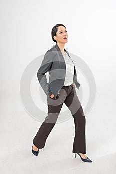 Full Body Photo of a Beautiful Brazilian Businesswoman in Office Suit