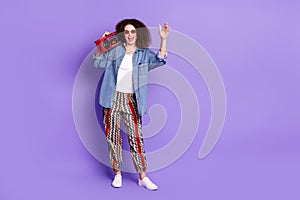 Full body photo of cool nice girl dancing boombox empty space wear denim shirt isolated on violet color background