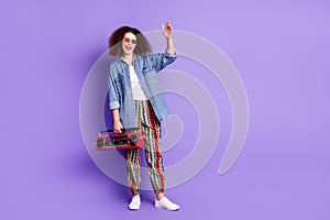 Full body photo of cool nice girl hold boombox empty space wear denim shirt isolated on violet color background