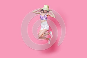 Full body photo of cute sweet lady feel shy hide her face panama hat jump high isolated pastel color background