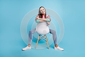 FUll body photo of sincere friendly confident nice glad optimistic lady having pause break sitting on chair leaning on