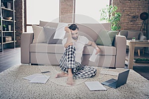 Full body photo of troubled confused marketer collar man sit carpet floor work home laptop cant prepare startup progress