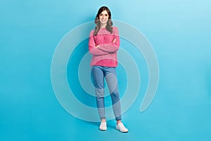 Full body photo of young positive attractive model woman wear stylish outfit pink jumper denim jeans folded hands