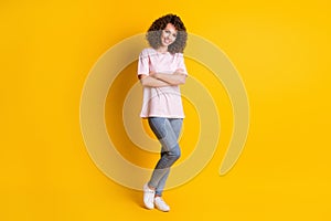 Full body photo of young pretty woman wear casual outfit successful folded arms isolated over yellow color background