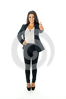 Full body portrait of a attractive businesswoman looking happy and successful