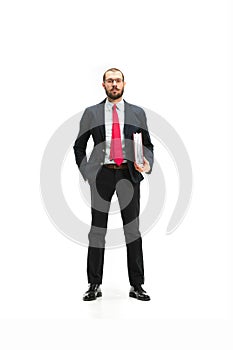 Full body portrait of businessman with folder on white