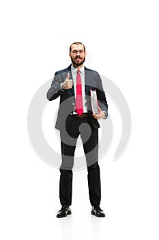 Full body portrait of businessman with folder on white
