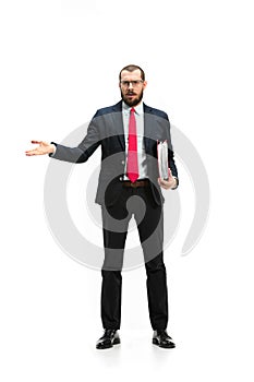 Full body portrait of businessman with folder on white