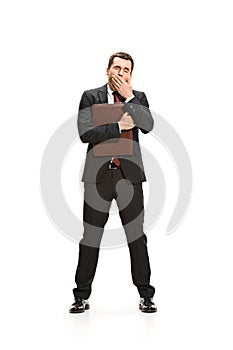 Full body portrait of businessman with folder on white