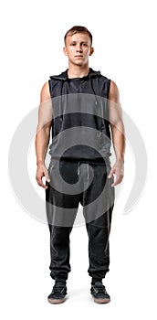 Full body portrait of handsome muscled young man, isolated on white background
