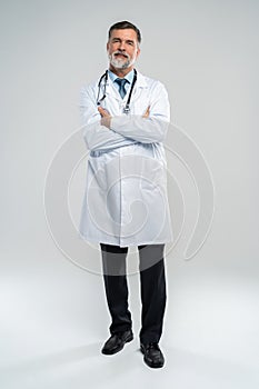 Full body portrait of happy smiling doctor, isolated on white background.