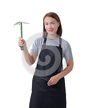 Full body portrait of a worker woman or Servicewoman in Gray shirt and apron is holding Shovel for Cultivators on white background