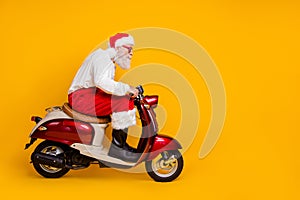 Full body profile photo of santa white hair grandpa riding speed x-mas theme party by bike wear trendy sun specs