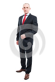 Full body senior business man standing being serious