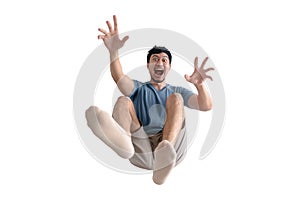 Full body of shocked Asian man being blown away on isolated background.