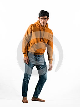 Full body shot of attractive young man with sweater, isolated