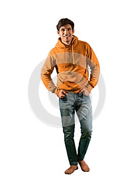 Full body shot of attractive young man with sweater, isolated