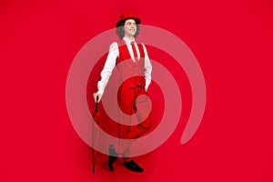 Full body size photo of classy teenager guy prepared for willy wonka movie announcement in cinema  on red color