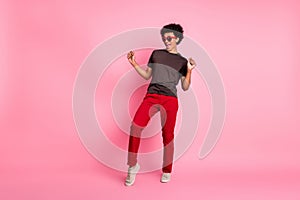 Full body size photo of cool student young guy in casual apparel sunglass night club discotheque isolated on pink color