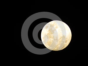 full and bright moon in the deep black sky photo