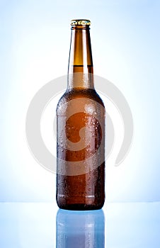 Full brown bottle with condensation