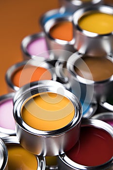 Full Buckets of rainbow colored oil paint