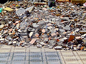 Full construction waste debris bags, garbage bricks, pile of rubble and material from demolished house