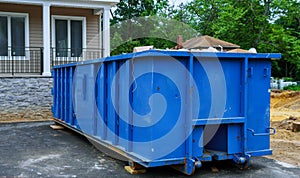 Full construction waste debris a building container, garbage bricks and material from demolished house