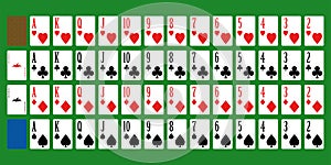 Full deck of poker playing cards on a green background.