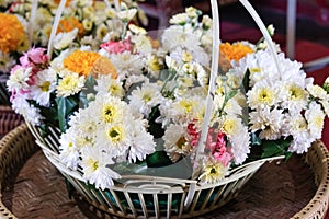 full decoraton fresh flower in circle basket. beauty daisy florist romantic valentine gift. Yellow marigold arrange for surprise photo