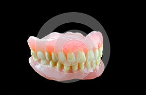 Full denture on black background