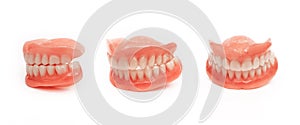 Full denture close-up. Dentures. Full removable plastic denture of the jaws. Jaw in all angles