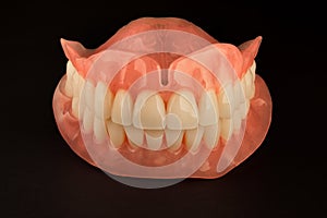 Full denture dentures close-up. Orthopedic dentistry with the us