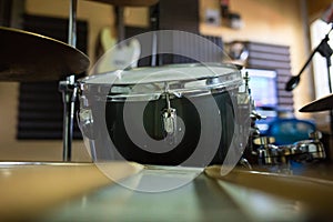 Full drums, microphones and other instruments from a soundproof music studio