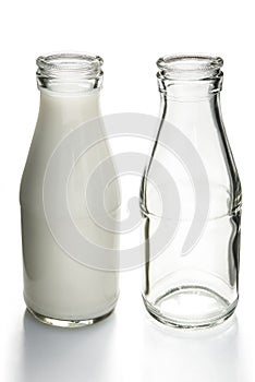 Full and empty milk bottles